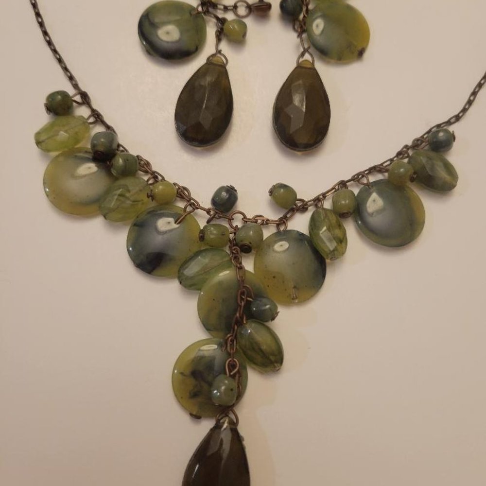 Necklace and earring set of various green coloration.